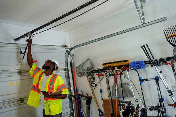 Professional Garage Door Panel Replacement technician working in Delaware County County, IN